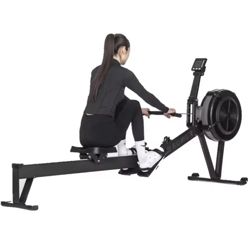 woman exercising on an air rowing machine